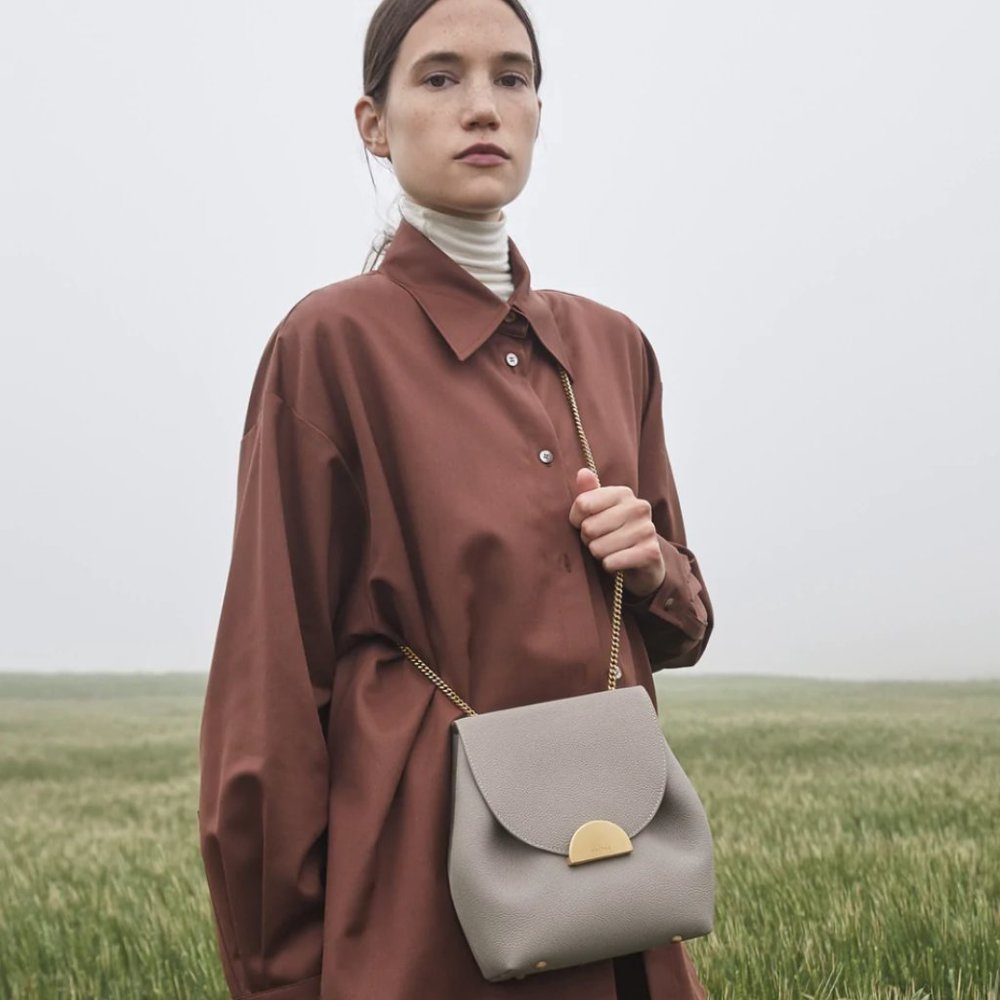 Polène taupe leather crossbody bag with gold-tone hardware